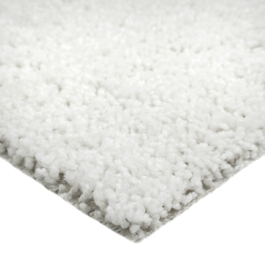 Cozy white shag area rug, soft texture, perfect for living room decor or bedroom comfort.