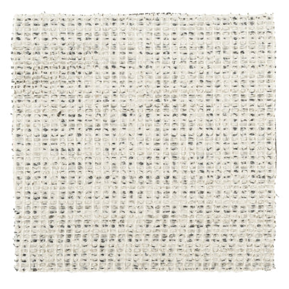 Textured cotton fabric swatch in off-white with black flecks, ideal for upholstery and crafts.