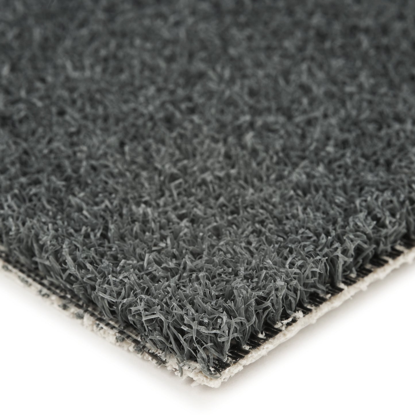 Dark gray artificial grass mat with textured surface, ideal for landscaping or indoor decor.