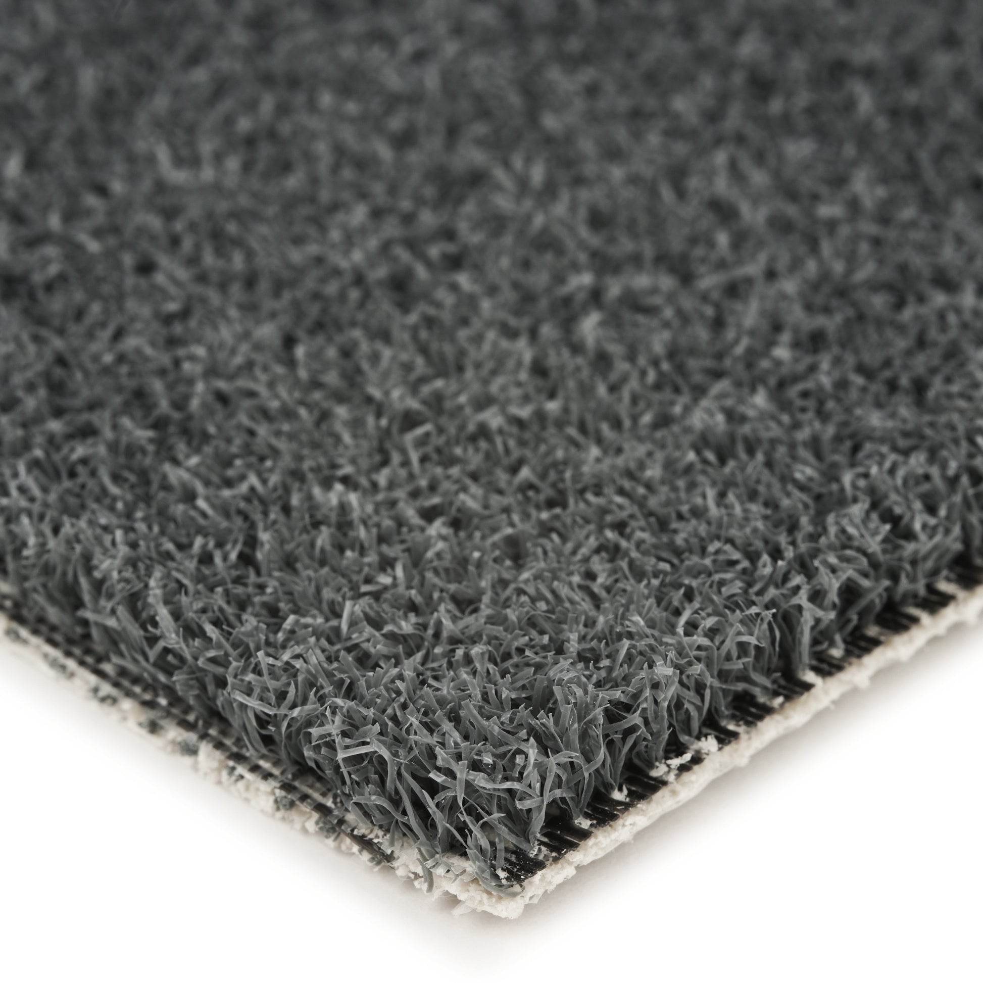 Dark gray artificial grass mat with textured surface, ideal for landscaping or indoor decor.