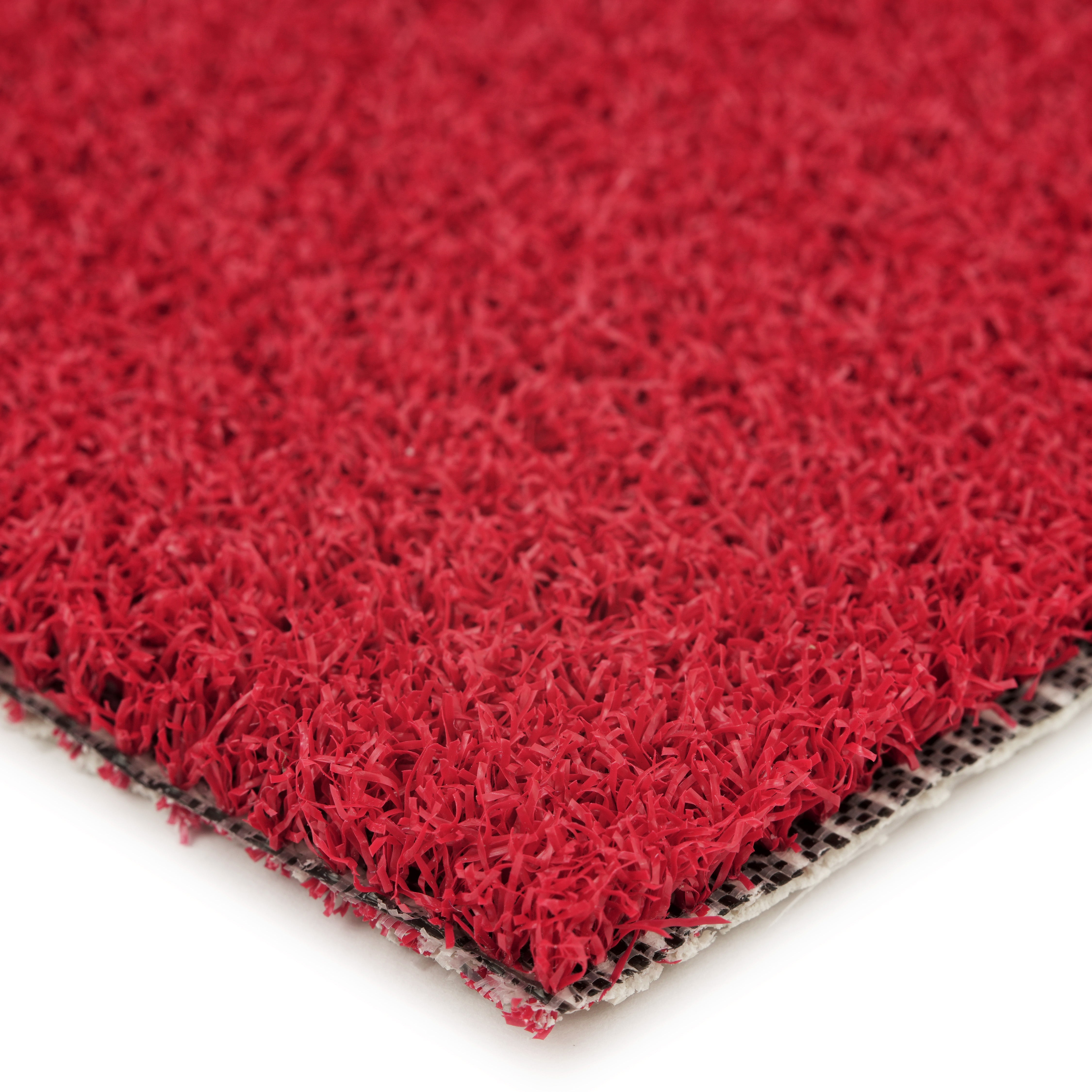 Red artificial turf mat, durable synthetic grass ideal for sports and landscaping projects.