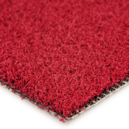 Red artificial turf mat, durable synthetic grass ideal for sports and landscaping projects.