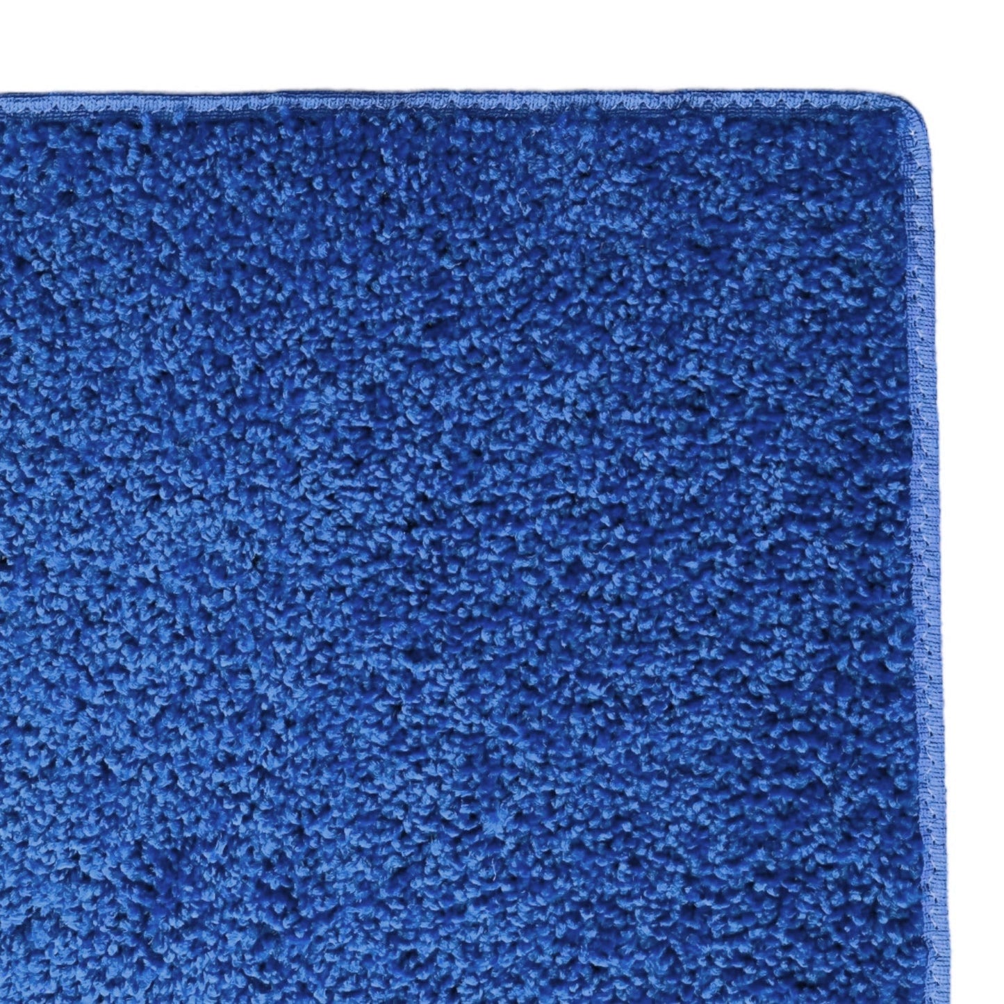 Soft plush blue area rug, ideal for cozy interiors, featuring a deep pile for added comfort.