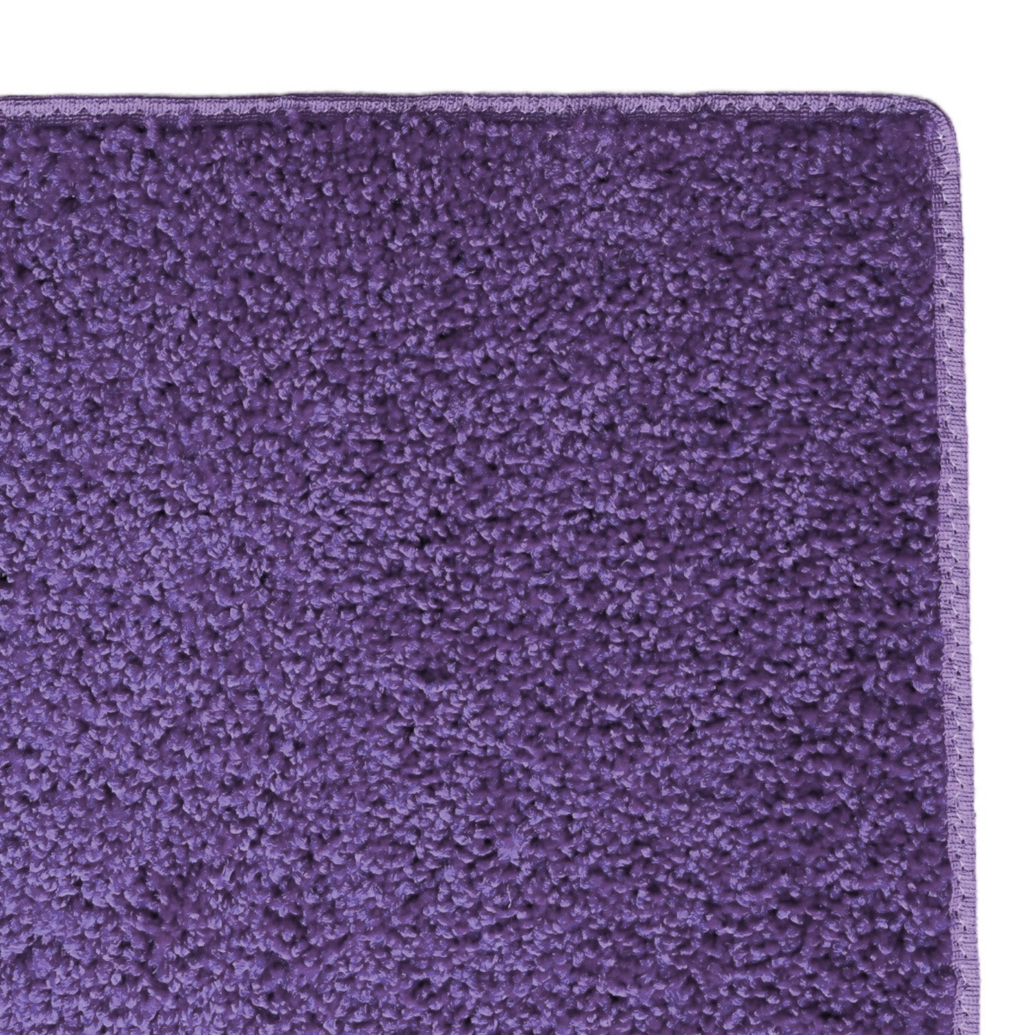 Soft purple shag rug, plush texture, ideal for living rooms and bedrooms, adds a vibrant touch to home decor.