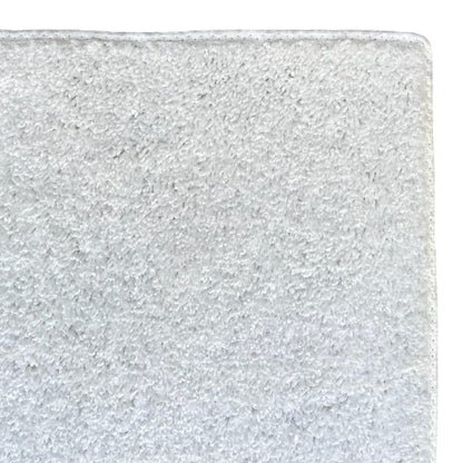 Soft gray cotton bath mat, super absorbent, ideal for stylish bathroom decor.