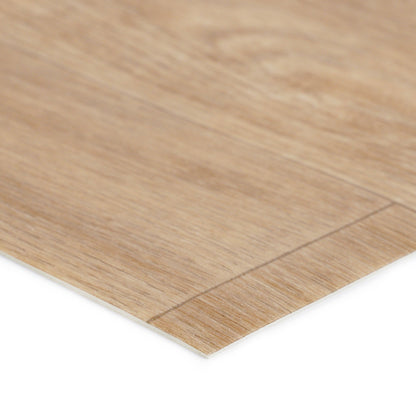 Light brown laminate flooring with wood grain texture, ideal for home interiors.